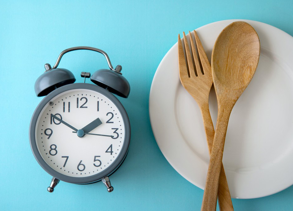 clock next to plate
