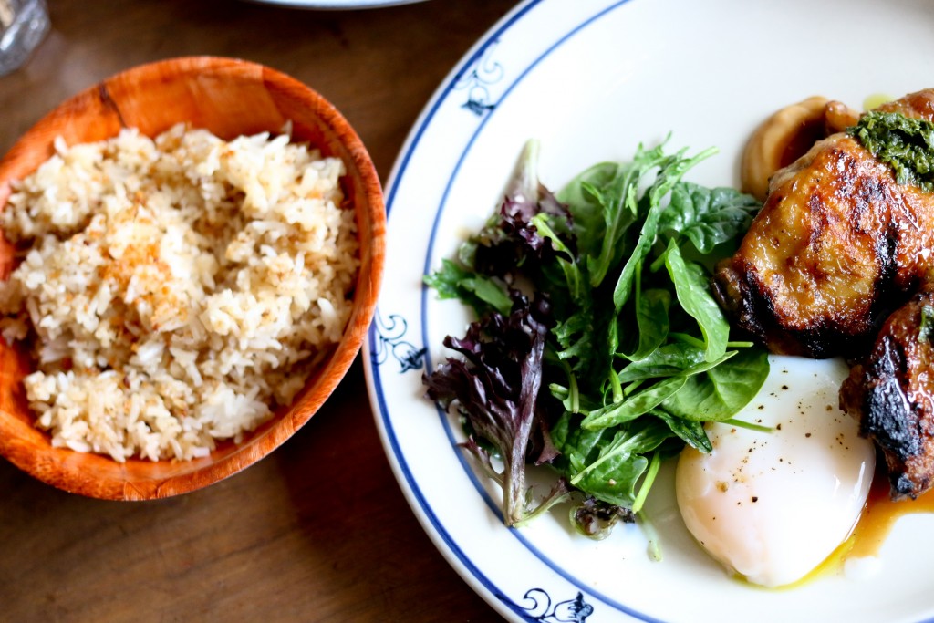 Asian fusion brunch with chicken adobo, fried garlic rice, poached egg and a spinach salad
