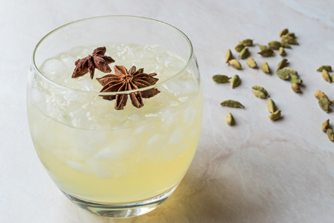 Cardamom Cocktail with Anise Star and Crushed Ice.