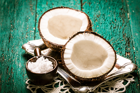 Coconut on wooden table.Organic healthy food concept.Beauty and SPA concept.