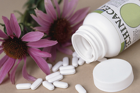 Echinacea flowers and pills