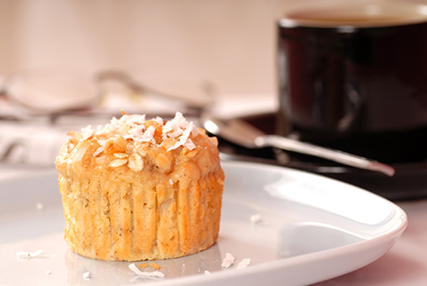 Tropical pineapple muffin with coconu, nuts and coffee