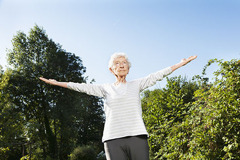 90 year old senior woman exercising outdoors