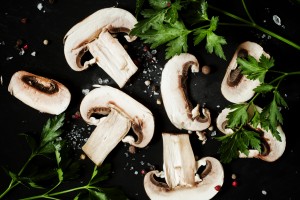 Food background slices of mushrooms, herbs and spices
