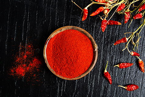 Grounded red paprika in a bowl