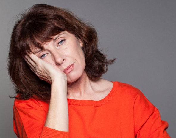 concept of lack of sleep and napping for mature woman