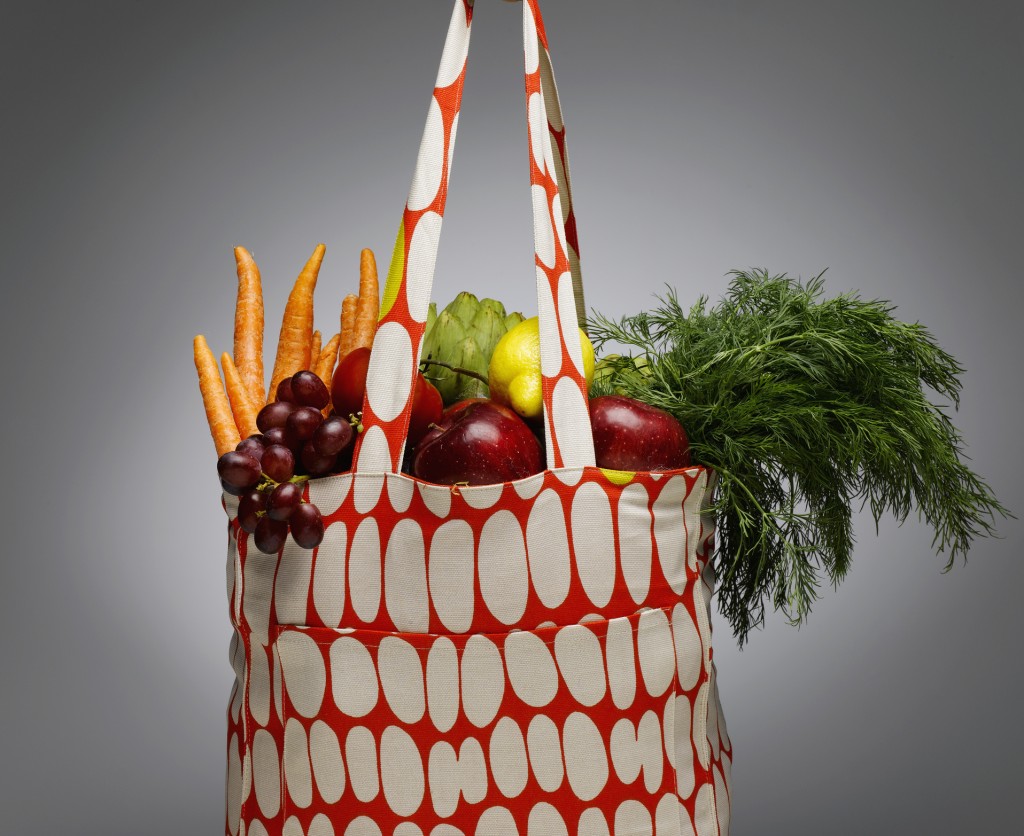 Shopping bag with fresh vegetables and fruits, close-up