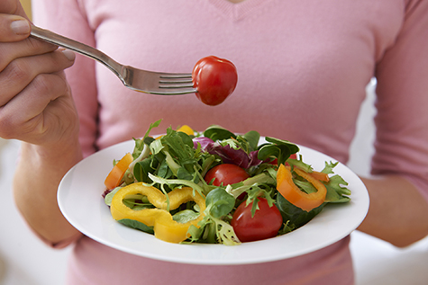 Detail Of Woman Holding Healthy Salad