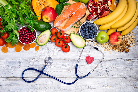 Healthy food for heart. Fresh fish, fruits, vegetables, berries and nuts. Healthy food, diet and healthy heart concept
